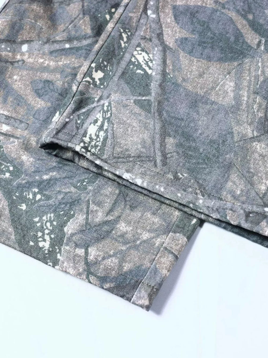 Men's camouflage cargo sweatpants with a grey and green leaf pattern.