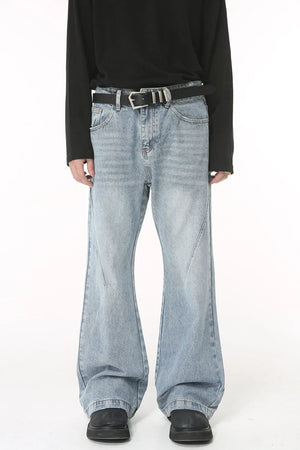 Flared denim jeans in medium wash with sculpted seam detail and a bootcut leg.
