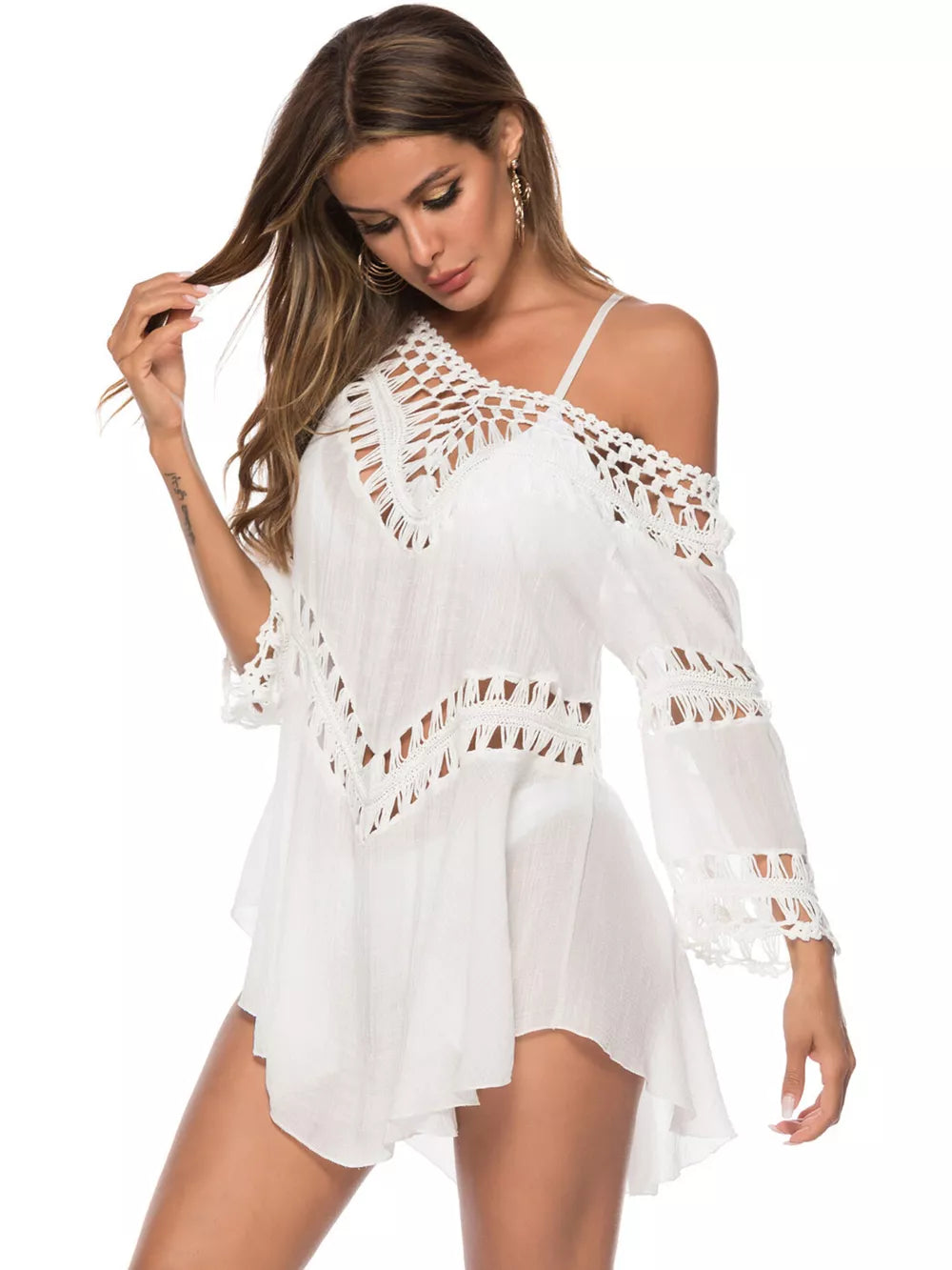 White flowy cover-up with crochet trim and cold shoulder sleeves.