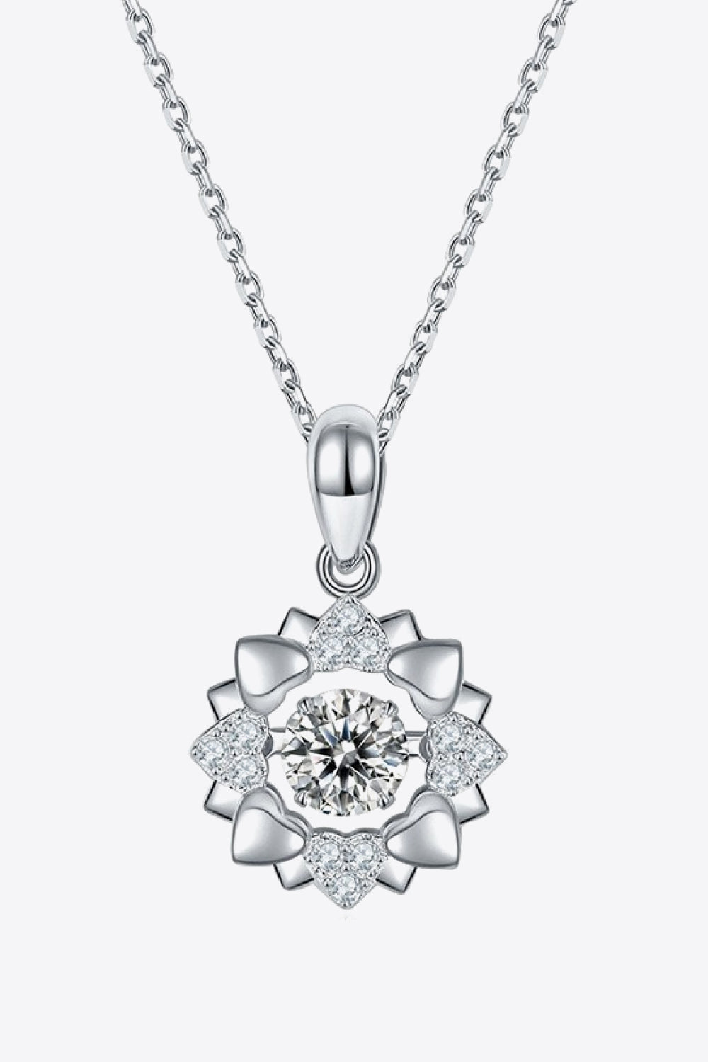 Silver diamond halo necklace with heart details on a sterling silver chain.
