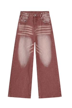 Sunset dip-dye wide leg jeans in rust, featuring a faded wash and relaxed fit.