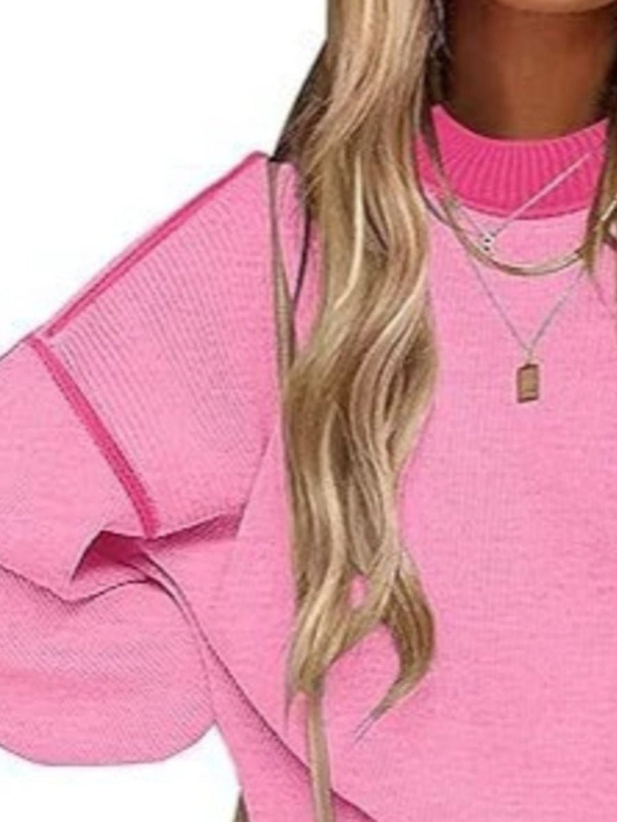 Pink oversized pullover sweater with round neck