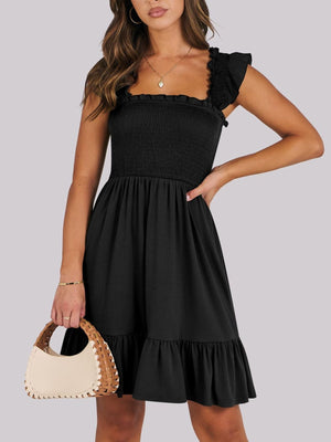 Black smocked mini dress with ruffle trim square neckline and flutter sleeves.