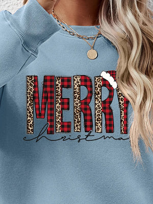 Misty Blue sweatshirt with "Merry Christmas" graphic in buffalo plaid and leopard print.