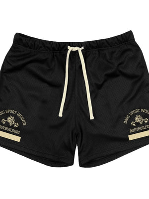 Black mesh sport shorts with drawstring and gold wolf graphic detail.