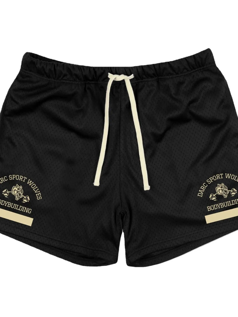Black mesh sport shorts with drawstring and gold wolf graphic detail.