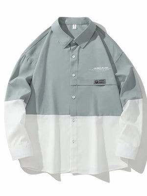 Two-tone oversized casual button-down shirt in French Blue and white color-block with chest pocket detail.