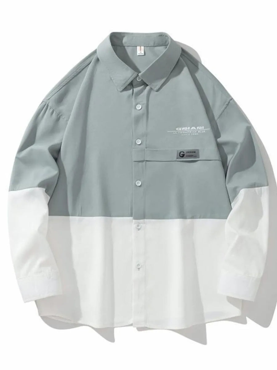 Two-tone oversized casual button-down shirt in French Blue and white color-block with chest pocket detail.