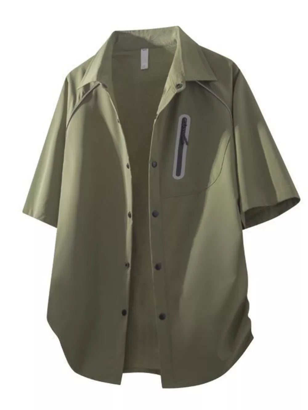 Oversized army green button-front overshirt with short sleeves and a zipper pocket detail.
