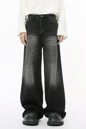 Black faded wash balloon leg jeans with a wide silhouette.