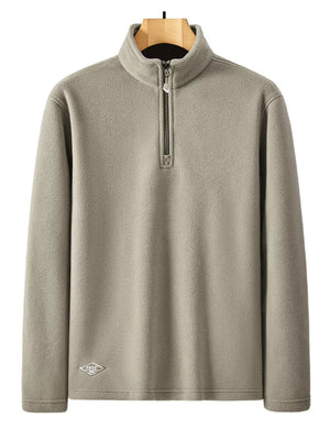 Men's gray fleece quarter zip sweatshirt with a small diamond logo detail.