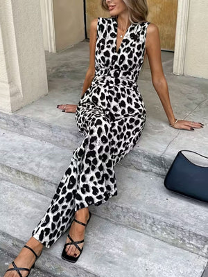 Chic sleeveless leopard print romper with V-neck and belted waist.