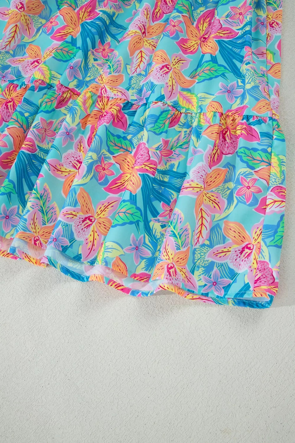 Tropical floral print v-neck tiered dress with scalloped trim detail