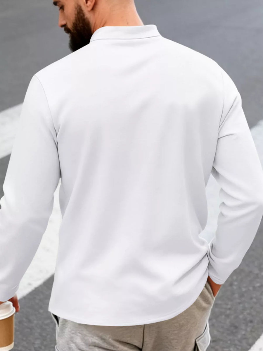 White long sleeve overshirt with band collar and button detail.