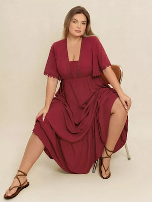 Burgundy lace detail flutter sleeve maxi dress with tiered skirt and square neckline.
