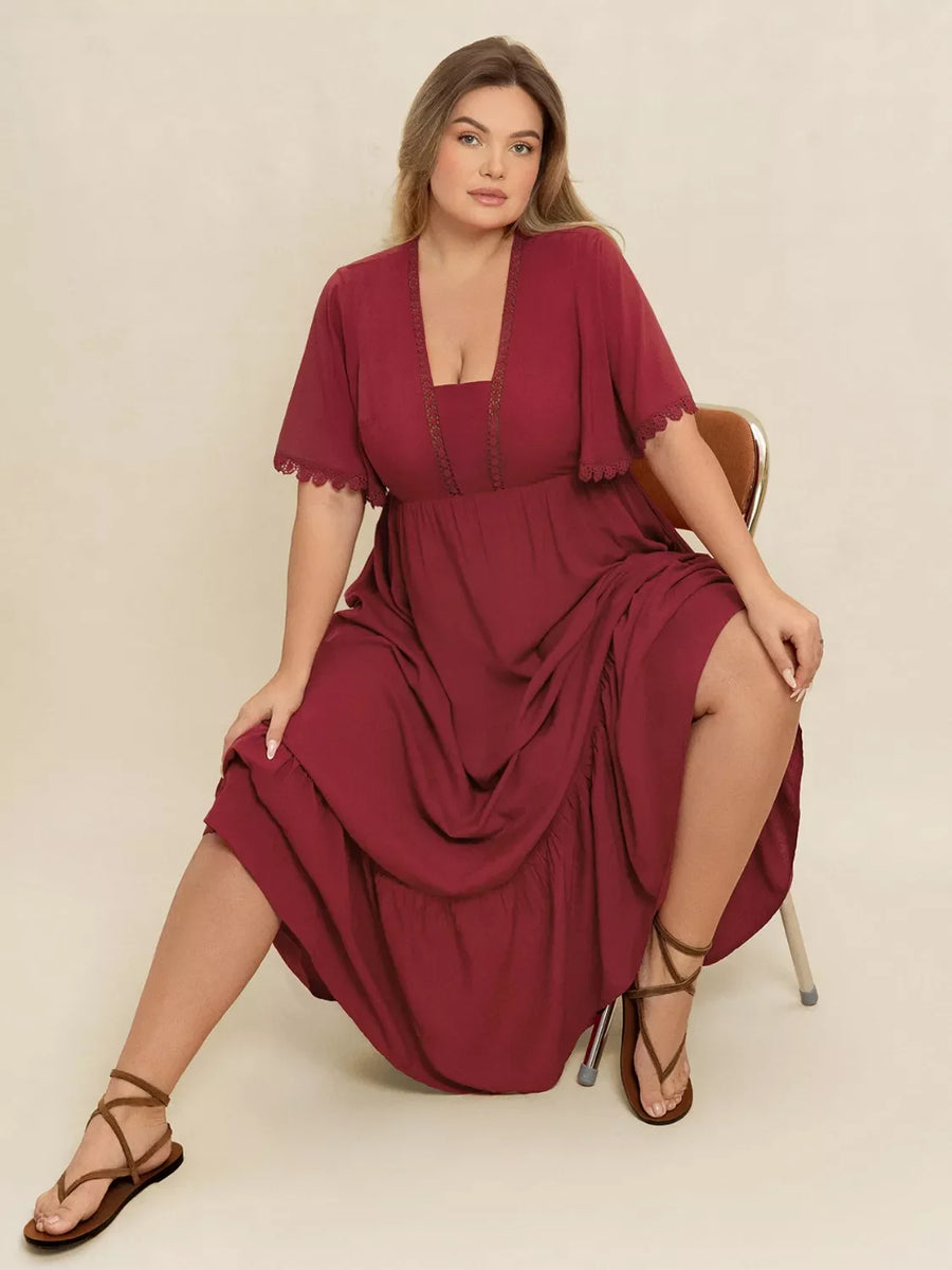 Burgundy lace detail flutter sleeve maxi dress with tiered skirt and square neckline.