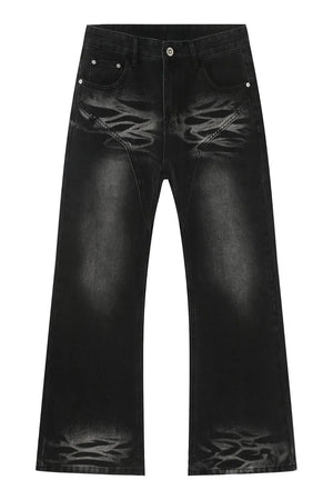 Dark wash flare jeans with distressed detailing and stitch accents.