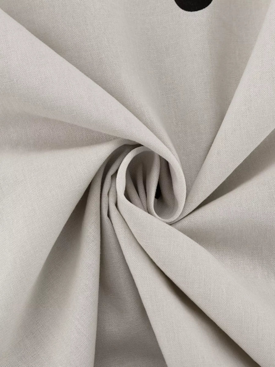 Light grey linen fabric with a subtle texture, folded and swirled.