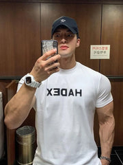 White crewneck t-shirt with reversed bold black graphic text on chest