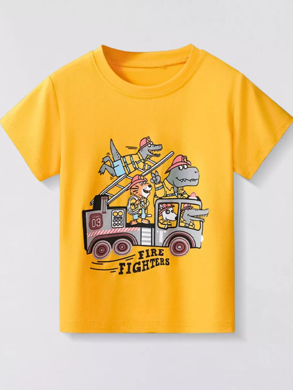 Yellow t-shirt with short sleeves and a crew neck featuring a graphic of cartoon firefighters on a truck.