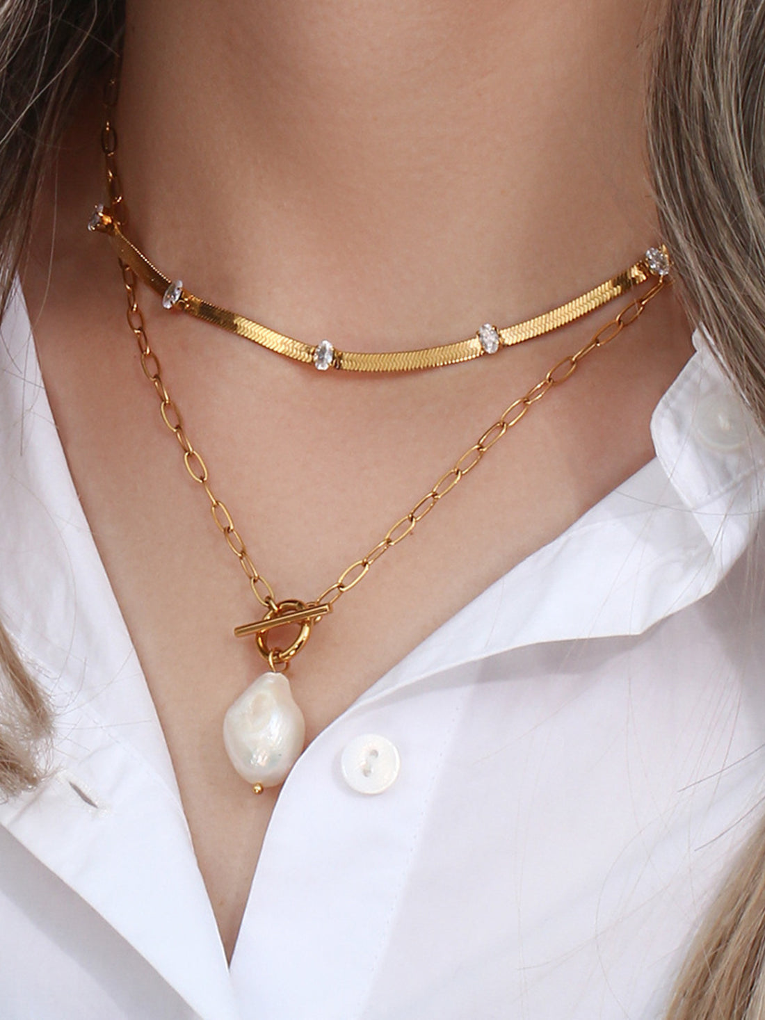gold necklace with princess and toggle clasp