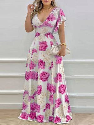 Floral V-neck maxi dress with ruffle sleeves in Fuchsia Pink, flowing skirt.