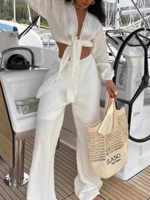 White textured tie-front crop top and wide-leg pants set with long sleeves
