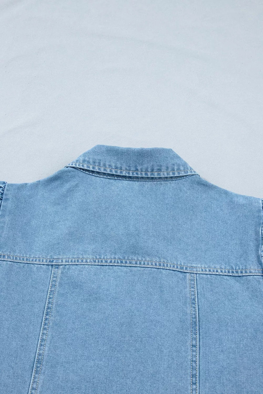 Light wash denim dress with button front detail and collar