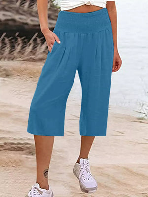 Blue linen blend cropped pants with smocked waist and pockets