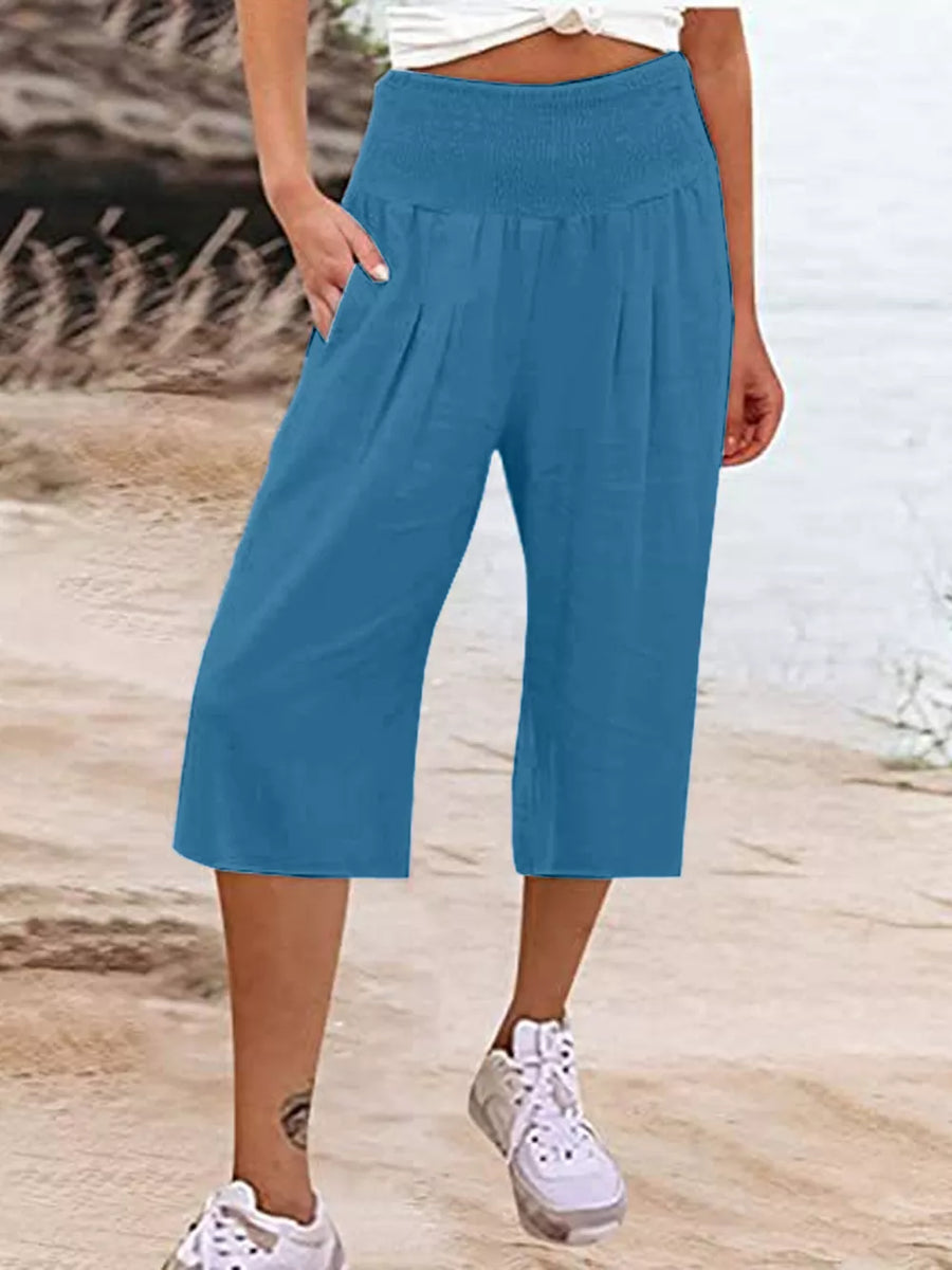 Blue linen blend cropped pants with smocked waist and pockets