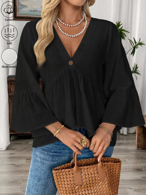 Black cotton V-neck blouse with bell sleeves and a button detail.