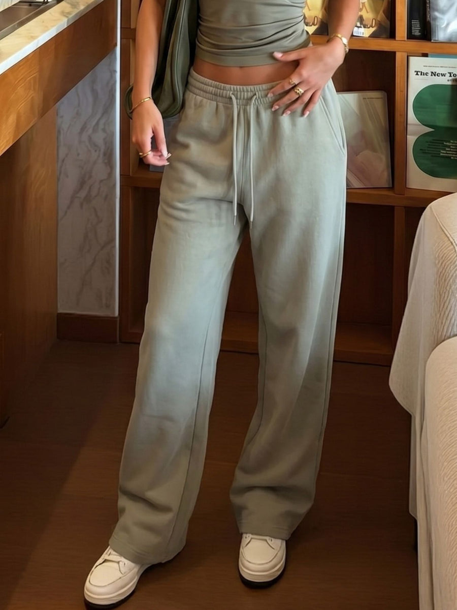 100% polyester Care instructions: Machine wash cold sweatpants in sage green with wide-leg silhouette