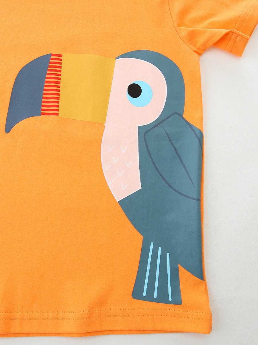 Orange cotton t-shirt with a playful toucan graphic, crew neck, and short sleeves.