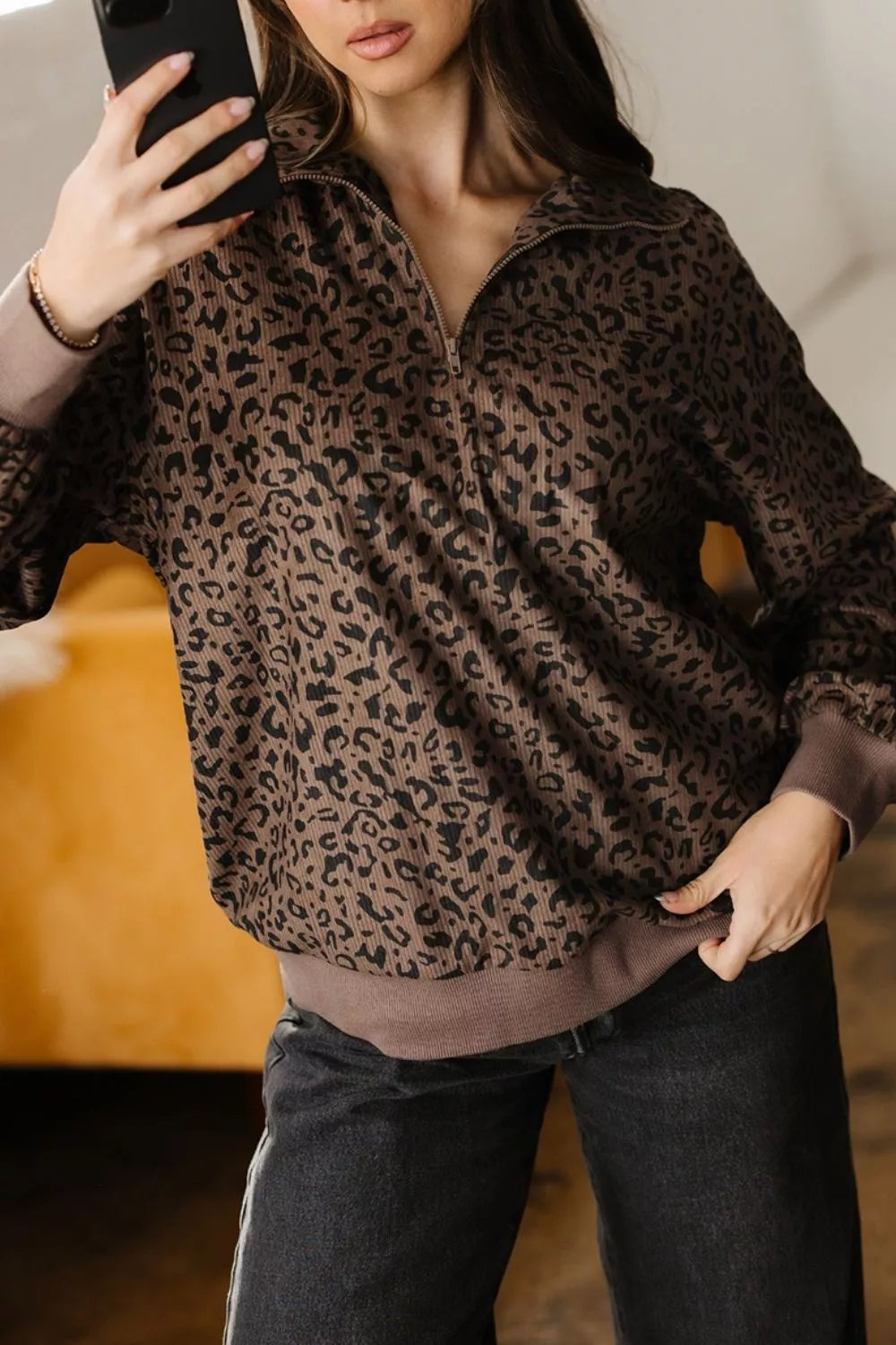 brown sweatshirt with ribbed cuffs and long sleeve