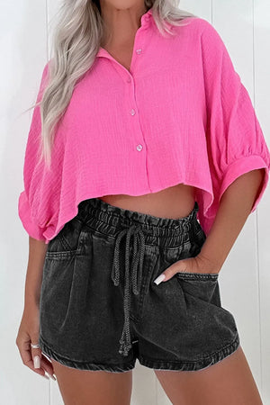 Paperbag waist denim shorts in black with drawstring and relaxed fit.
