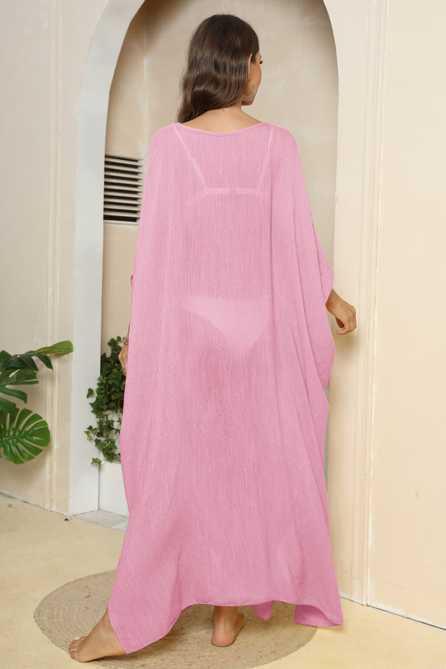 Pink oversized caftan cover-up with side slits, sheer fabric, V-neck, flowing sleeves