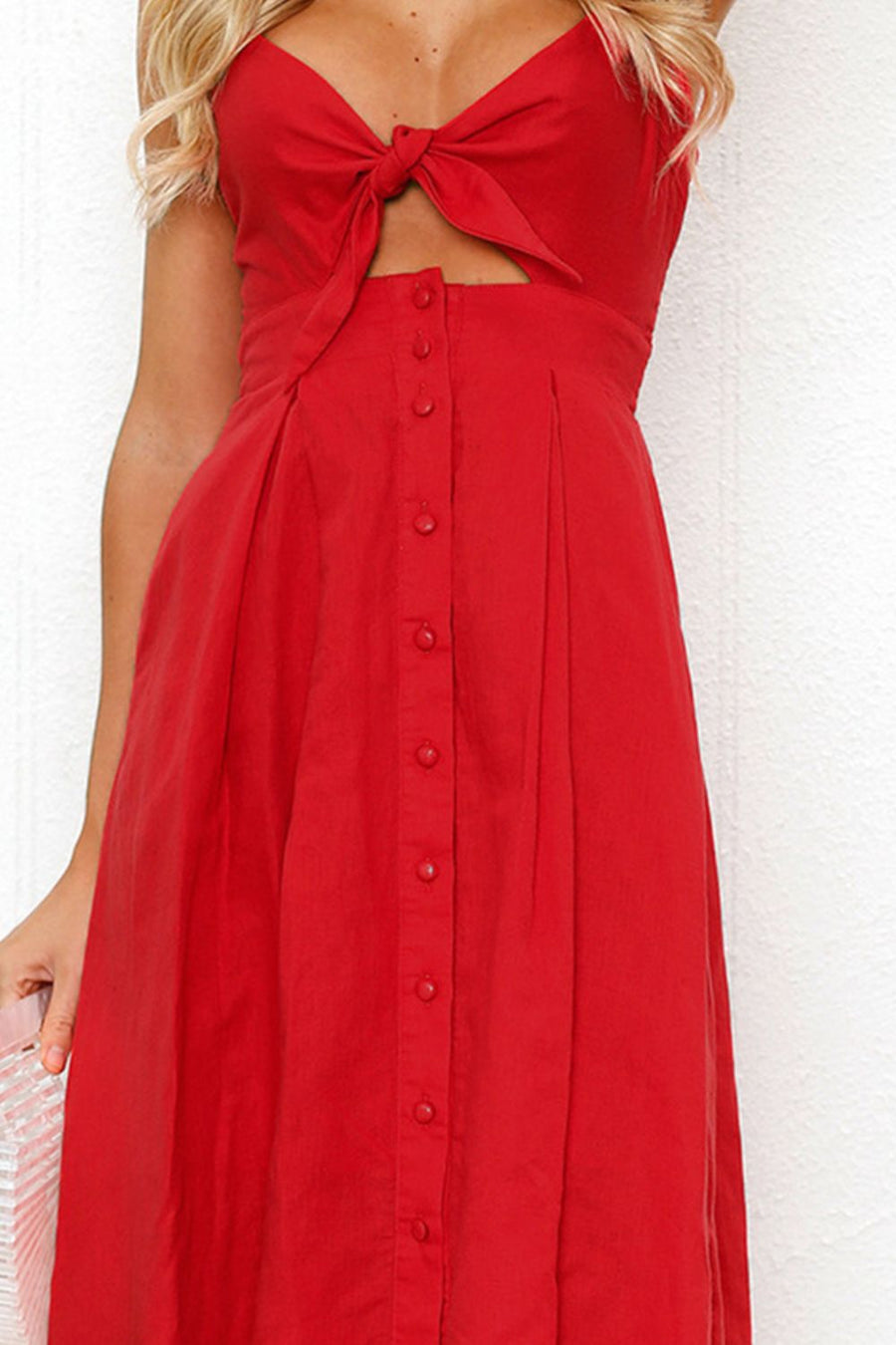 Red midi sundress with bow-front cutout and button detail