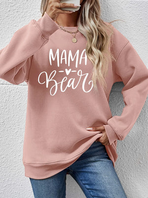 Mama Bear graphic sweatshirt in Blush Pink with crew neck and long sleeves.