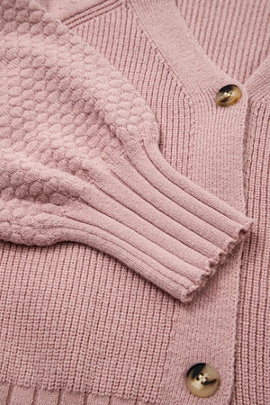 blush pink cardigan with button-front and ribbed knit
