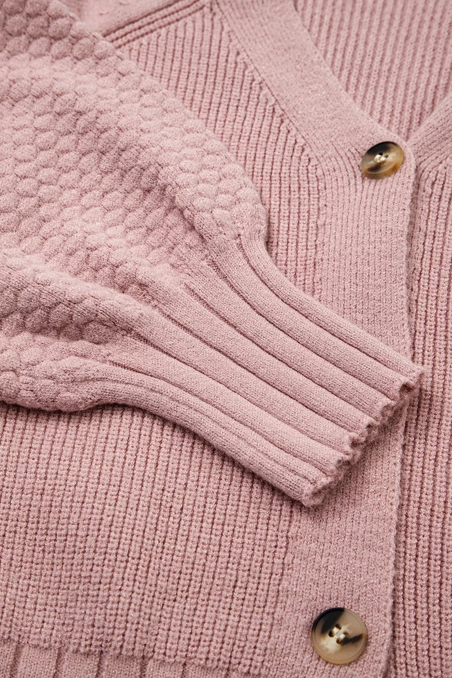 blush pink cardigan with button-front and ribbed knit