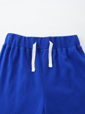 Blue cotton toddler shorts with elastic waistband and white drawstring.