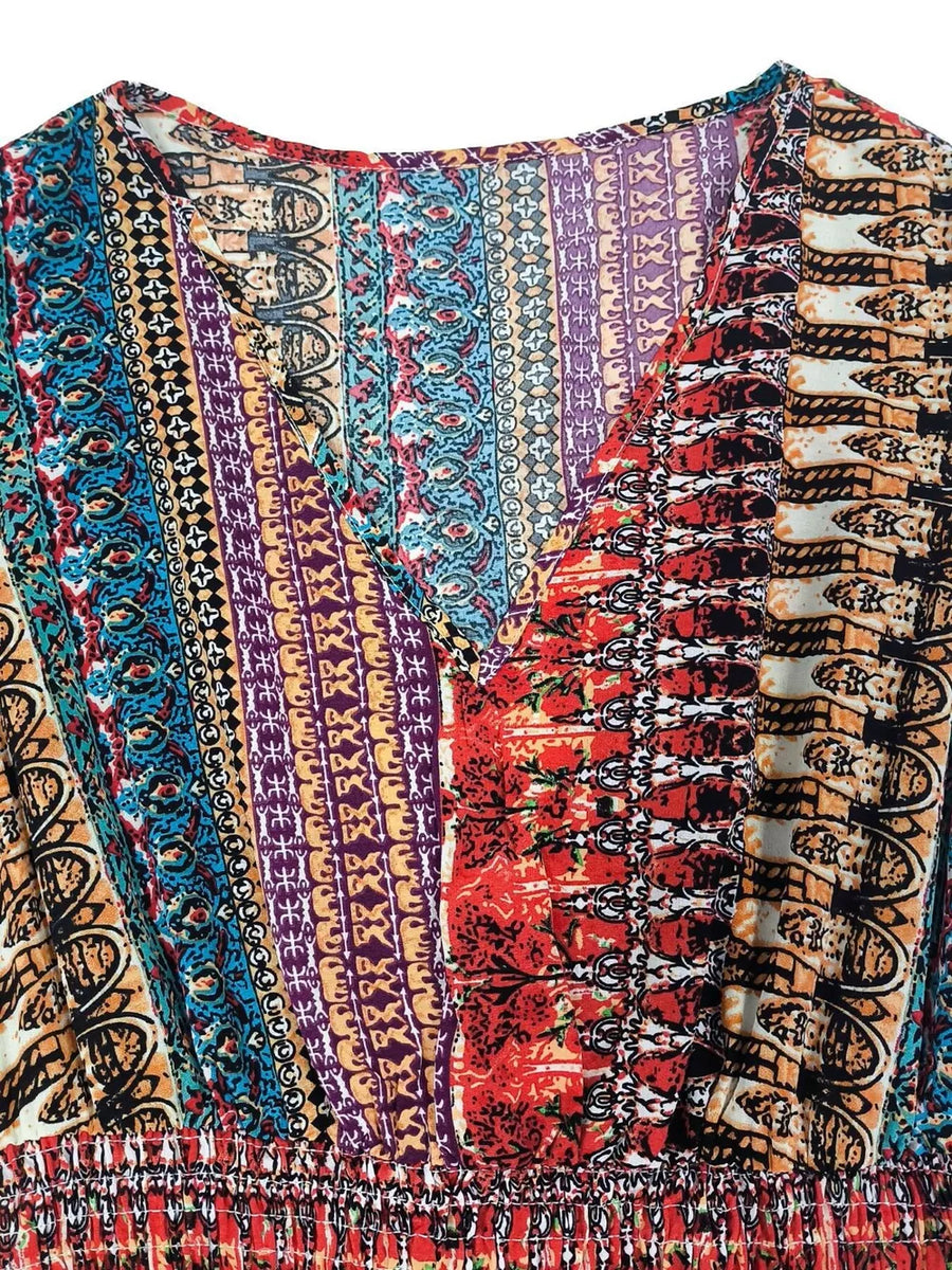 Bohemian maxi dress with colorful patchwork print and V-neckline