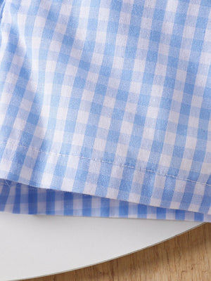 Baby blue gingham shorts with white detail stitching