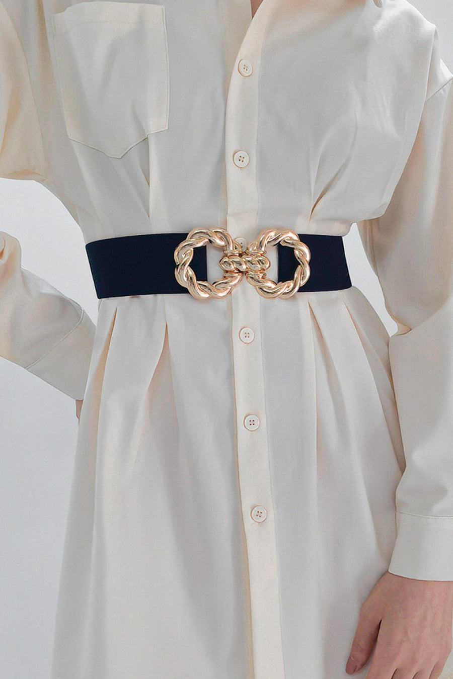 Black stretch belt with gold braided knot buckle detail