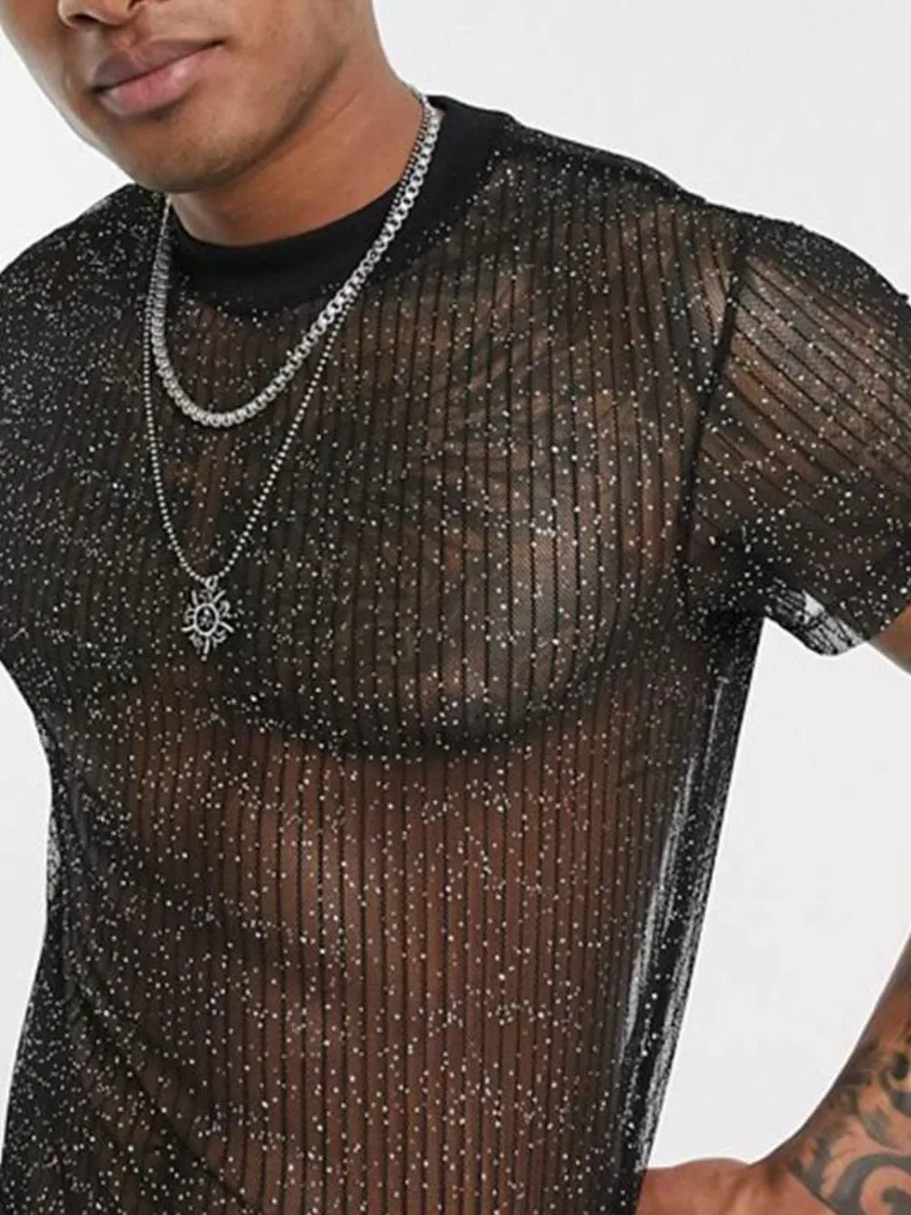 Black glitter mesh mock neck tee with vertical stripes and short sleeves.