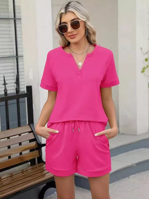 Fuchsia pink relaxed two-piece set with drawstring shorts and pockets