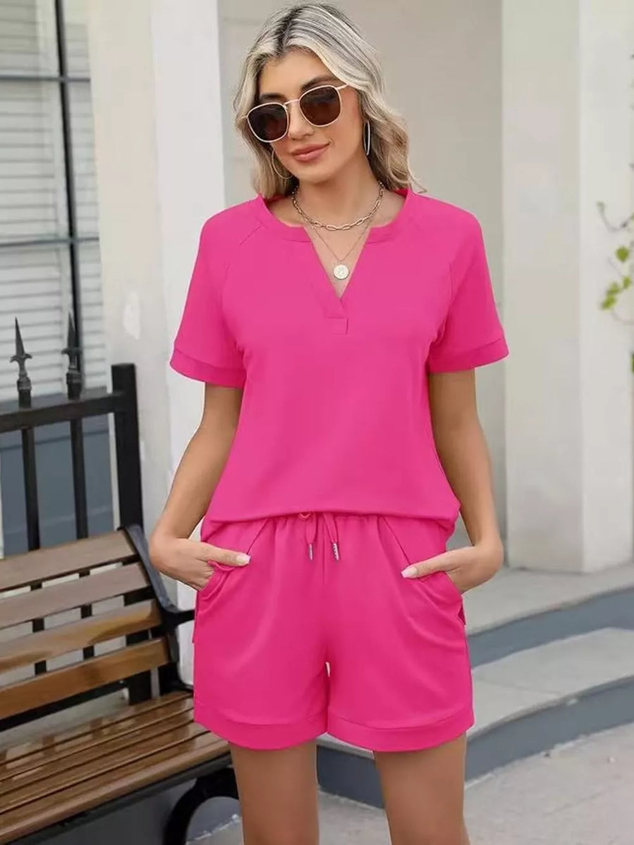 Fuchsia pink relaxed two-piece set with drawstring shorts and pockets