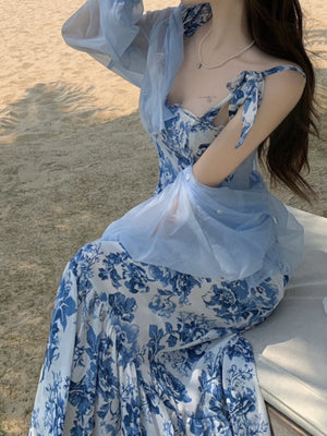 royal blue midi dress featuring adjustable straps and floral