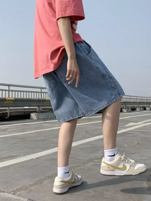 Blue denim shorts with button detail and adjustable drawstring, casual men's shorts