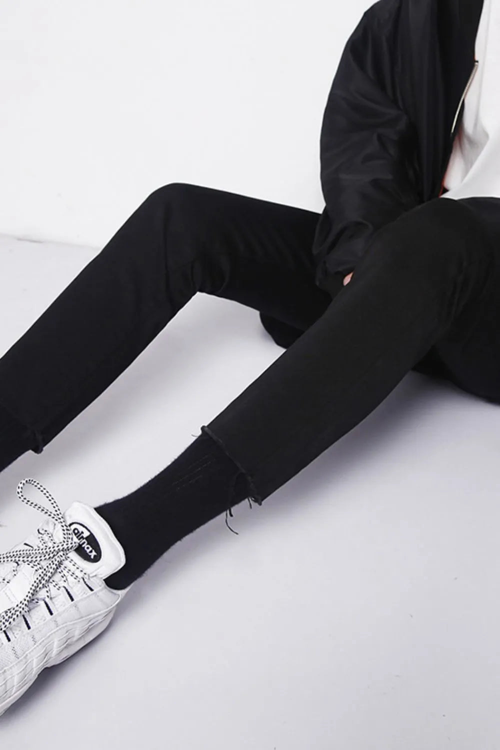 Men's dark skinny jeans with raw hem detail